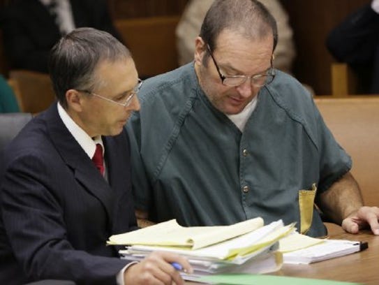 Ronald Ambrose and his client Bob Bashara look over