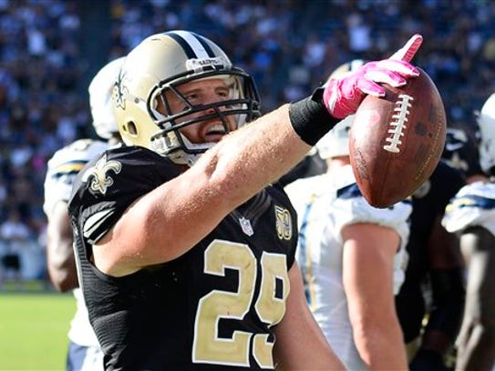 New Orleans Saints fullback John Kuhn reacts after