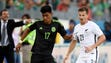 Mexico's Jesus Gallardo (17) moves the ball defended