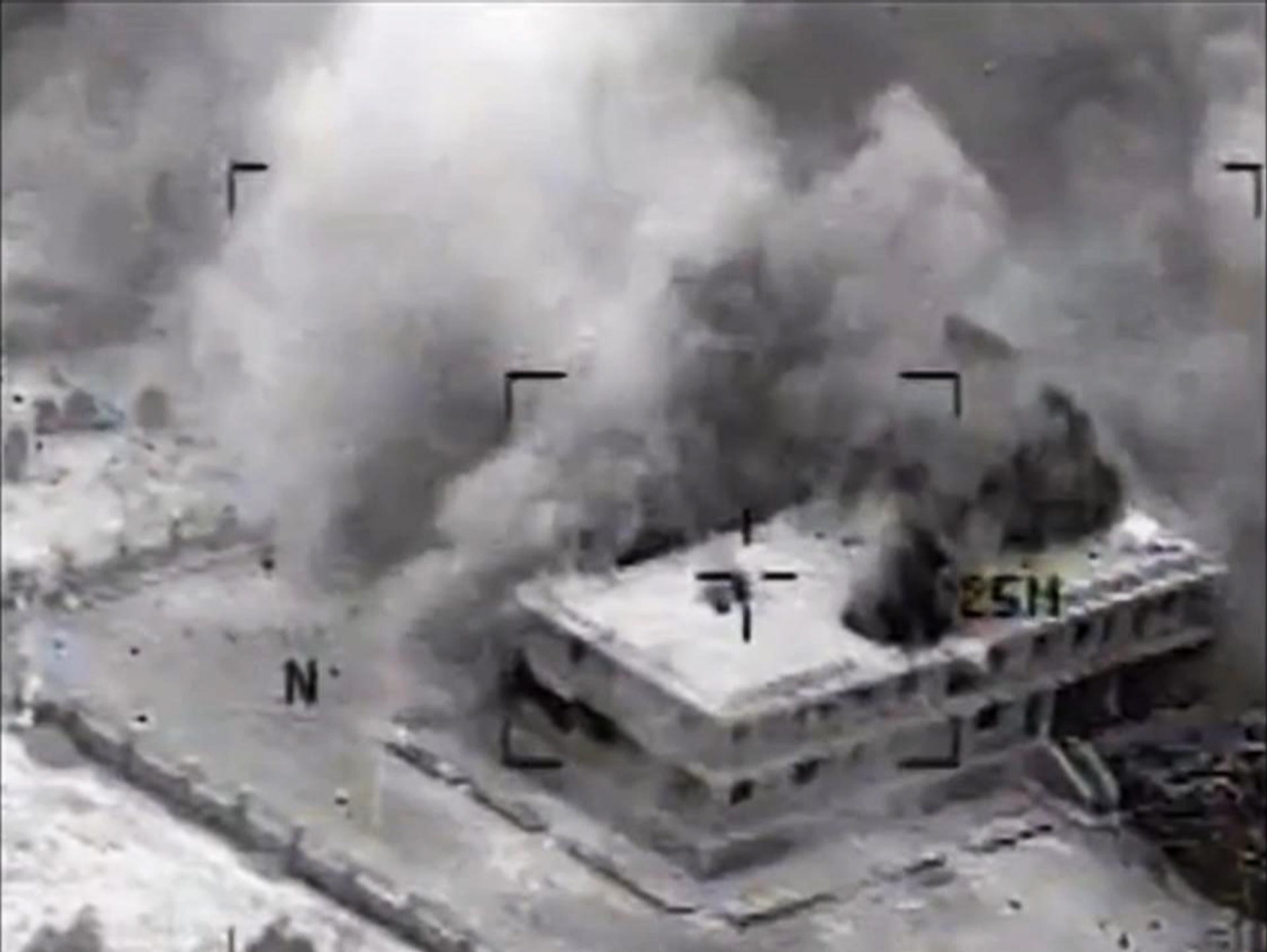 A still image made from video shows a structure in Tall Al Qitar, Syria moments after a U.S. airstrike.