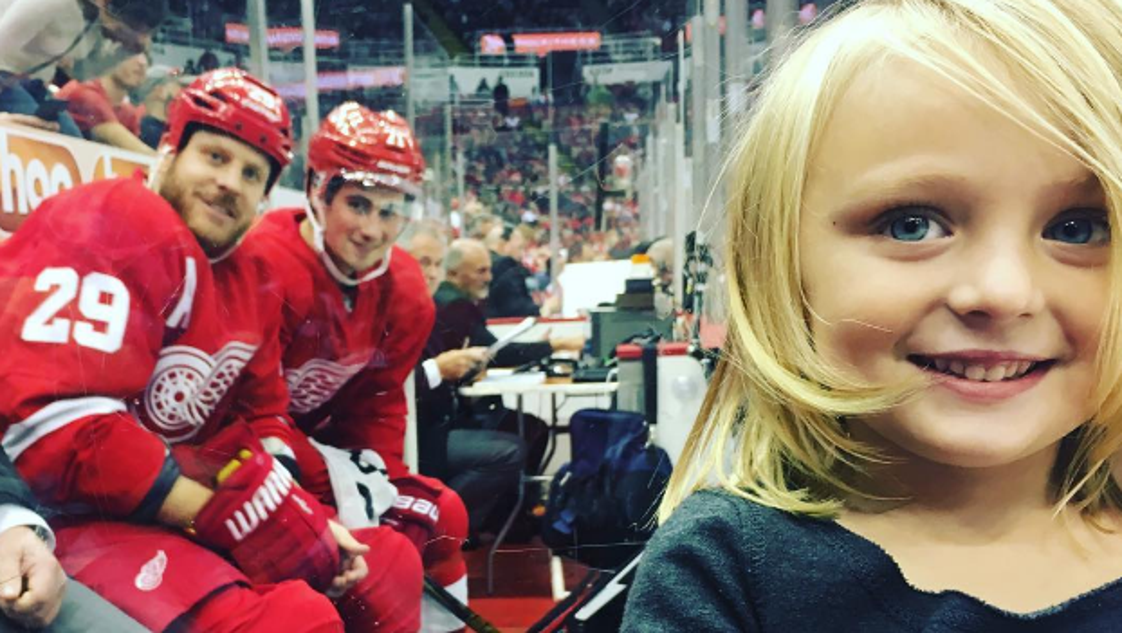 See this? Detroit Red Wings pull off the cutest photobomb ever