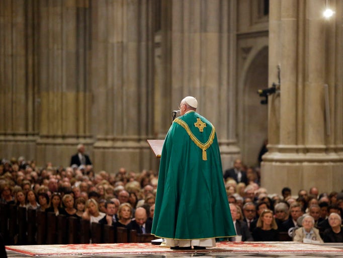 Pope Francis speaks during evening prayer service at