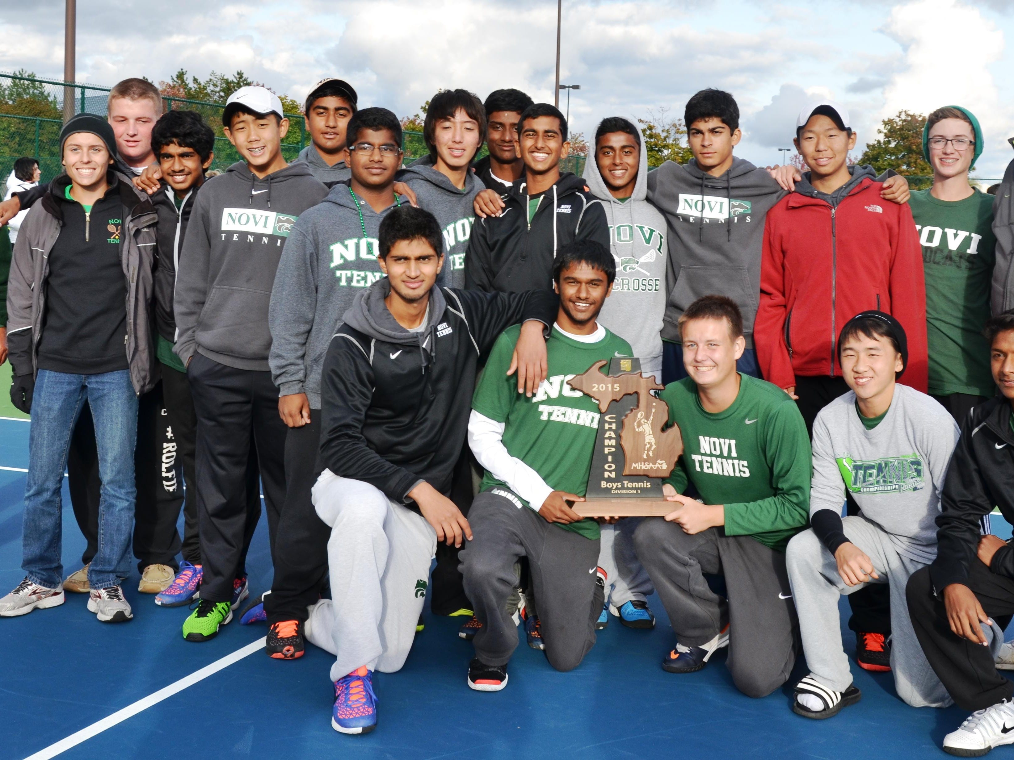 The host Novi boys tennis team captured its fourth straight MHSAA Division 1 regional Friday.