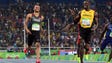 Andre De Grasse (CAN) and Usain Bolt (JAM) react after