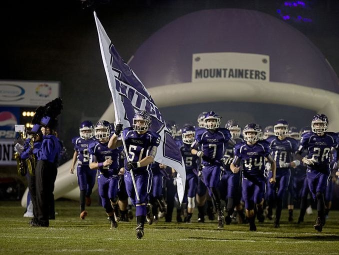 Will Atkins (51) and Mitchell will play for the NCHSAA 1-AA championship next weekend in Winston-Salem.