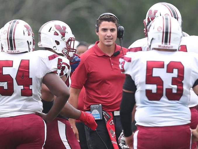 Nyack defeated Byram Hills 54-34 at Byram Hills High School on Sept. 12, 2015. Coach Mike Ramponi (center) resigned from Nyack and was named the athletic director at Ardsley.