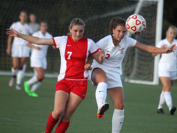 Somers forward Jenna Menta (right) controls the ball in a Sept. 23, 2015 win over North Rockland. Both teams return a strong core of talented players.