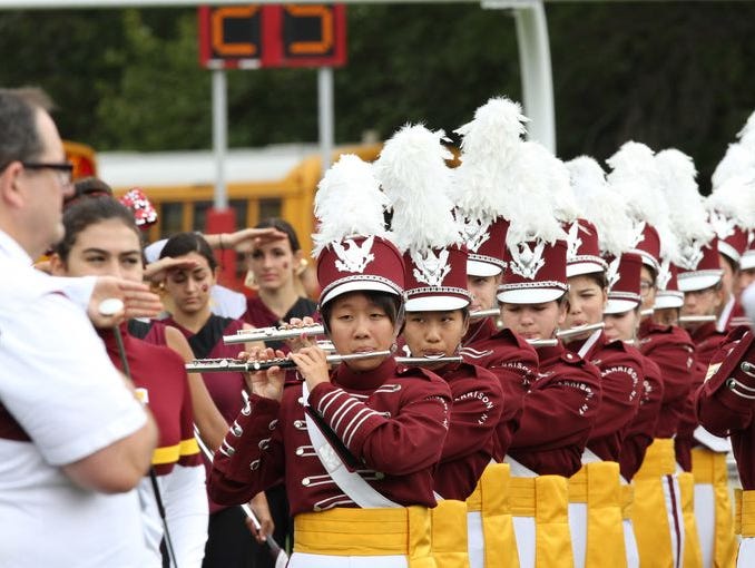 The Harrison band plays prior to the football team's game against Rye at Rye High School on Sept. 13, 2014. Rye won 24-13.