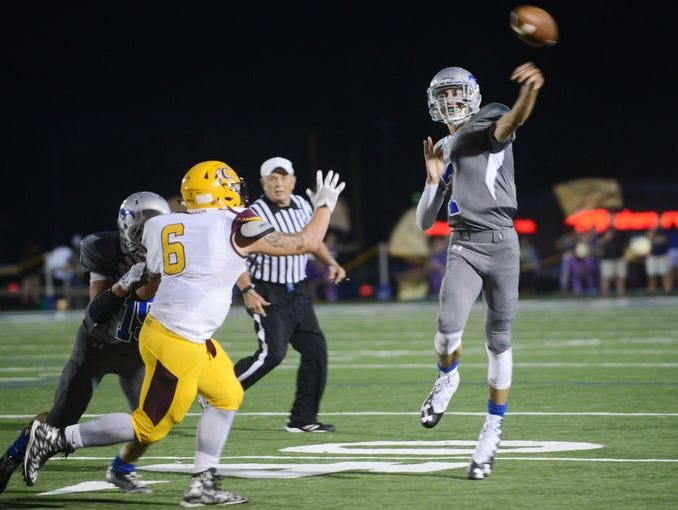 Smoky Mountain's Cole Hooper throws a pass during last Thursday's home win over Cherokee.