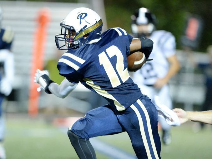 Micah Jenkins (12) and Roberson play at Erwin on Friday.
