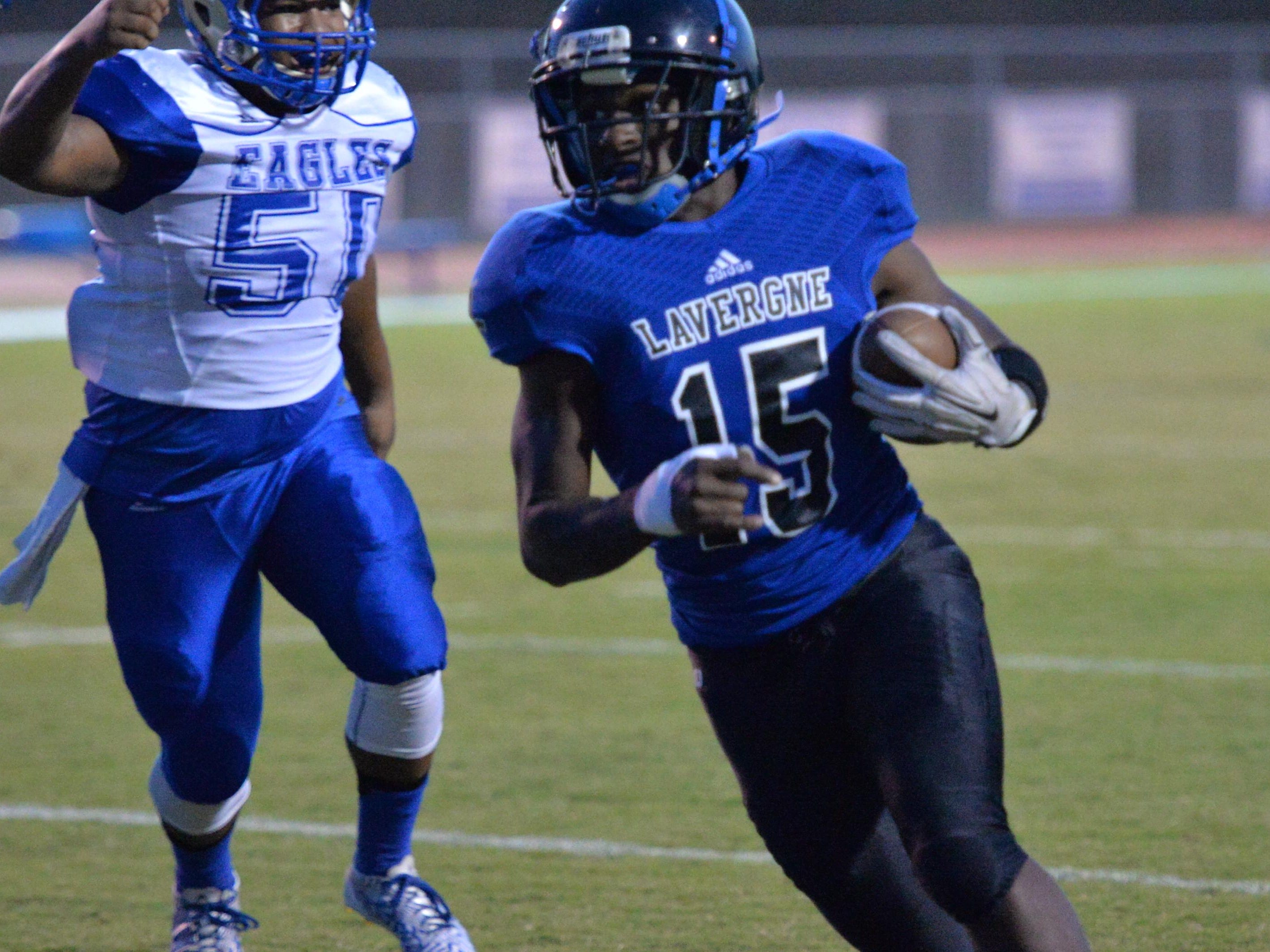 La Vergne’s Nick Jones runs the ball for the Wolverines during Friday’s loss to Shelbyville.