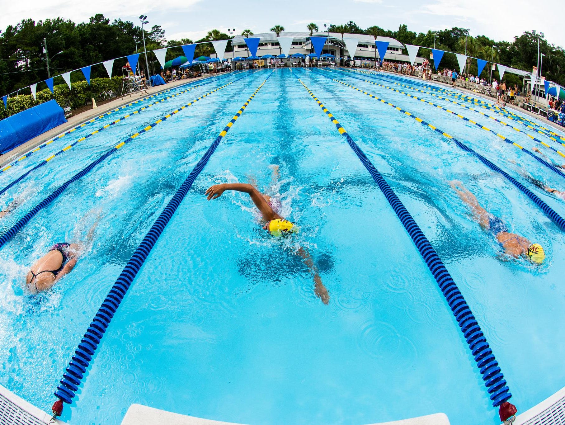 Lincoln junior Sara-Kellett Clark swims during ATAC’s Long Course Invitational over the summer.