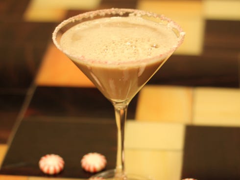 The brisk and minty peppermint mocha martini is made with Kahlua, vanilla vodka, peppermint schnapps and Godiva chocolate liqueur.
