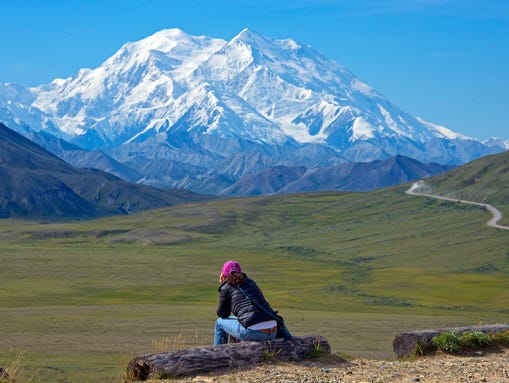 A woman gazes at Mount McKinley in Denali National