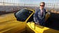 Ford Motor Executive Chairman Bill Ford steps out of a fully assembled 2015 Mustang convertible. It was on display after an unveiling to honor 50 years of the Ford Mustang on the 86th floor observation deck of the Empire State Building.