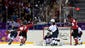 USA goalkeeper Jessie Vetter (middle) reacts after giving up a third period goal to Canada forward Marie-Philip Poulin (29).