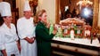 Hillary Clinton gets a look at a gingerbread model