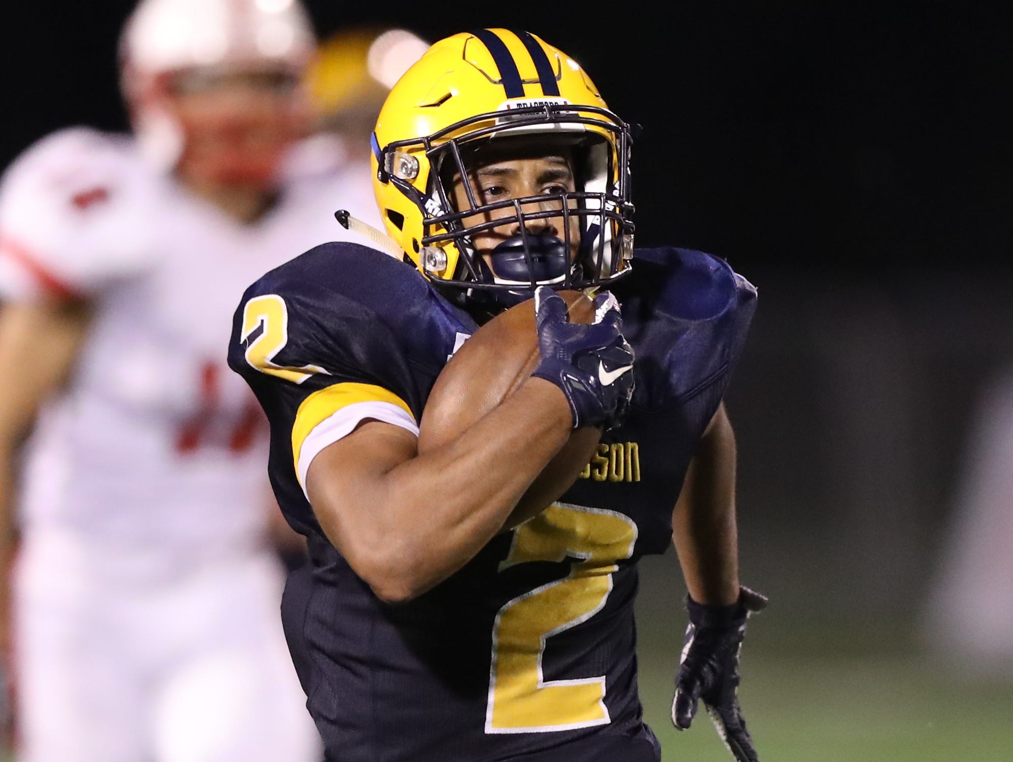 Dearborn Fordson's Aziz Alhanek runs the ball against Canton's during the second half of Fordson's 40-35 win Friday at Wayne State.