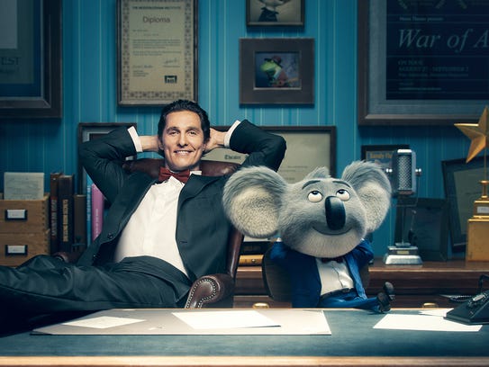 Matthew McConaughey with his character, Buster Moon,