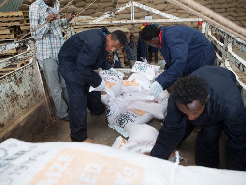 Bags of Iowa-based DuPont’s seed are loaded into a