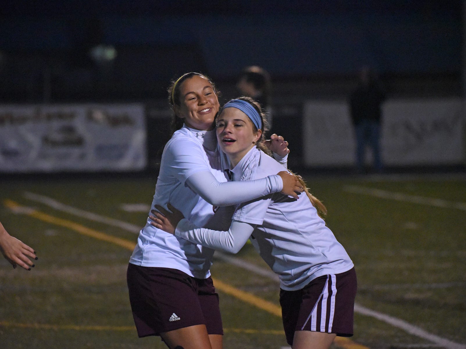 Windsor High School girls soccer players Leticia Oliva, left, and Bailey Zehr hug while celebrating a goal in a game earlier this season. The Wizards beat Battle Mountain 1-0 on Thursday to advance to the semifinals of the Class 4A state playoffs.