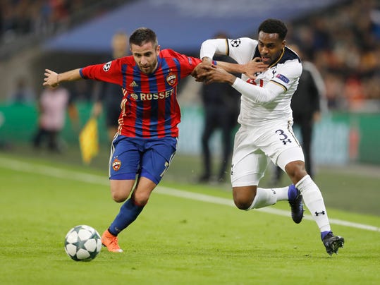 Tottenham's Danny Rose, right, challenges for the ball with CSKA's Zoran Tosic during the Champions League group E soccer match between Tottenham Hotspur and CSKA Moscow at Wembley stadium in London, Wednesday, Dec. 7, 2016. (AP Photo/Frank Augstein)