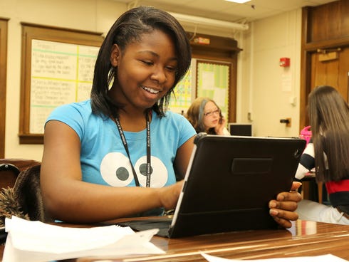 Auburne Gipson works on her iPad during a recent French I class at East High School in Des Moines. Teacher Angela Palmersheim created online flashcards including French verbs and their English translations.