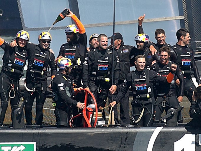 Oracle Team USA celebrates defeating Emirates Team New Zealand in the 34th America's Cup on Sept. 25, 2013, in San Francisco. Oracle Team USA clinched the America's Cup on Wednesday in an epic comeback destined for sports history books. The back-to-back champions crossed the finish 44 seconds ahead of challenger Emirates Team New Zealand, notching an unprecedented eight wins in a row and keeping possession of yachting's coveted prize.
