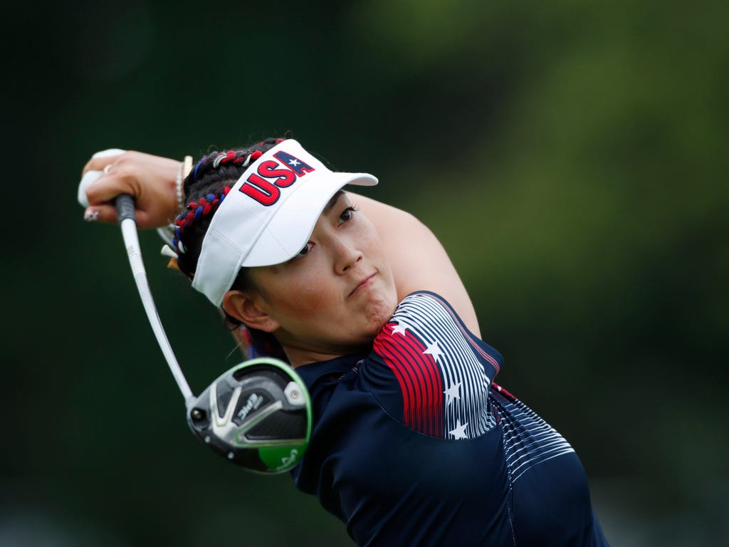 Michelle Wie of the U.S. tees off on the 18th hole during the second practice round for The Solheim Cup International Golf Tournament at Des Moines Golf and Country Club in West Des Moines, Iowa.