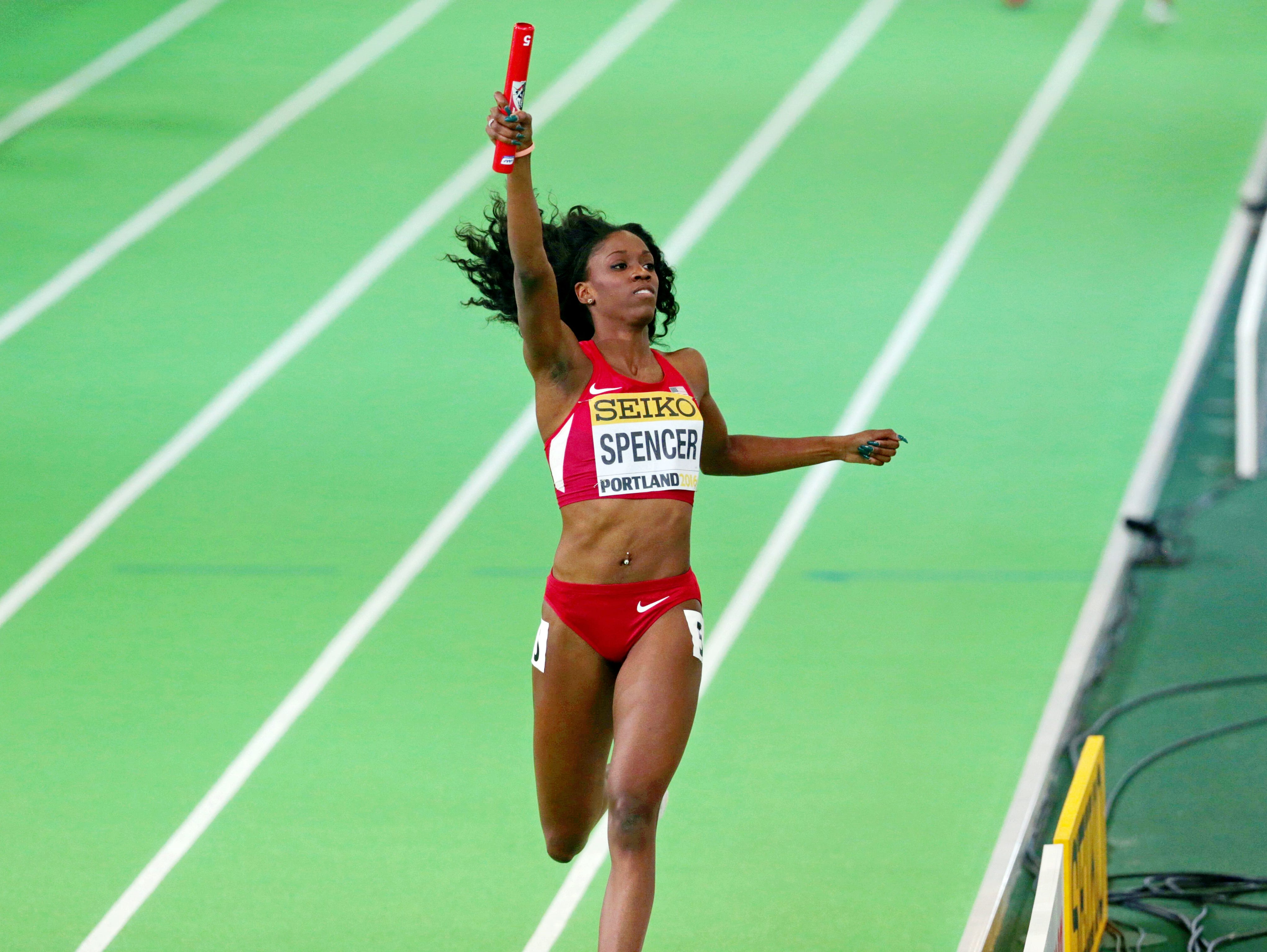 Ashley Spencer USA) win the women's 4x400m relay (3:26.38)at Oregon Convention Center.