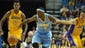 Denver Nuggets guard Ty Lawson (3) is defended by Los Angeles Lakers guards Steve Nash (10) and Nick Young (0) at Citizens Business Bank Arena.