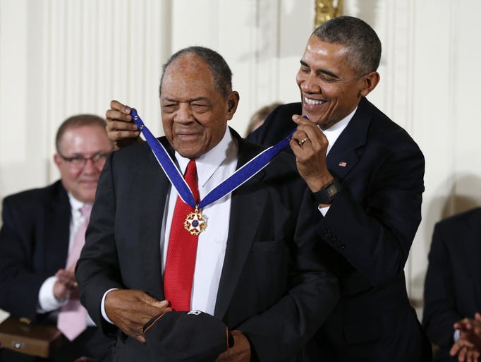 President Barack Obama presents the Presidential Medal