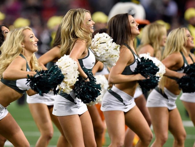 Oregon cheerleaders perform before the game at AT&T