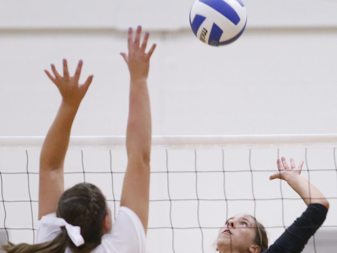 Padua's Claire Bisson hits in the second game of Padua's 3-0 win at Wilmington Friends on Thursday.