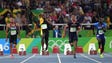 Usain Bolt (JAM) wins the men's 100-meter final.
