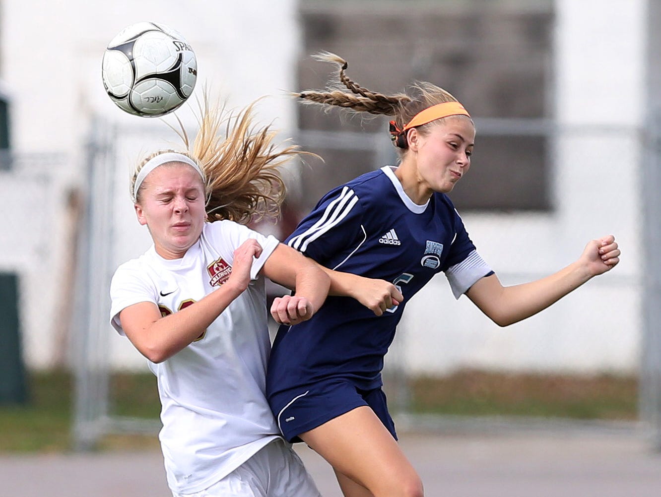 From left, Arlington's Molly Feign (29) and Suffern's Abby Bosco (5) battle for ball control during the girls soccer Section 1 Class AA championship game at Yorktown High School Oct. 30, 2016. Arlington won the game 2-0.
