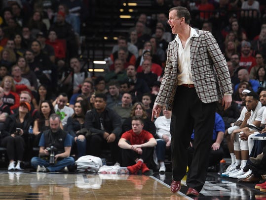 Wearing a plaid blazer in honor of former Portland Trail Blazers coach Jack Ramsay, Blazers coach Terry Stotts yells out to his team during the second half of an NBA basketball game against the Los Angeles Lakers in Portland, Ore., Wednesday, Jan. 25, 2017. The Blazers won 105-98. (AP Photo/Steve Dykes)