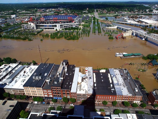 Floodwaters rise around the riverfront area of downtown