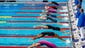 Athletes compete in the Women's 100m Backstroke semi