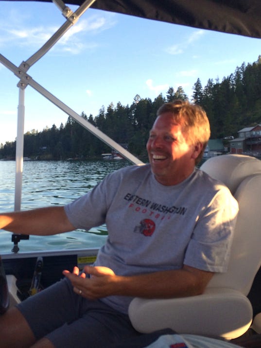 Jim McElwain in the family boat back in Montana on Flathead Lake. (Photo courtesy of Karen McElwain)