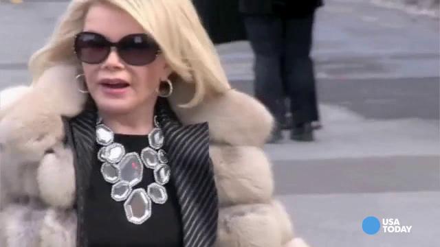 Joan Rivers, promoting her book in July, has been rushed to the hospital, reports say.