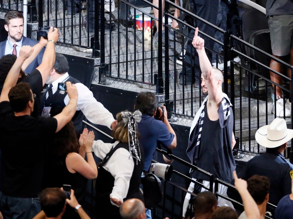The San Antonio Spurs' Manu Ginobili leaves the court after Game 4 of the Western Conference finals.