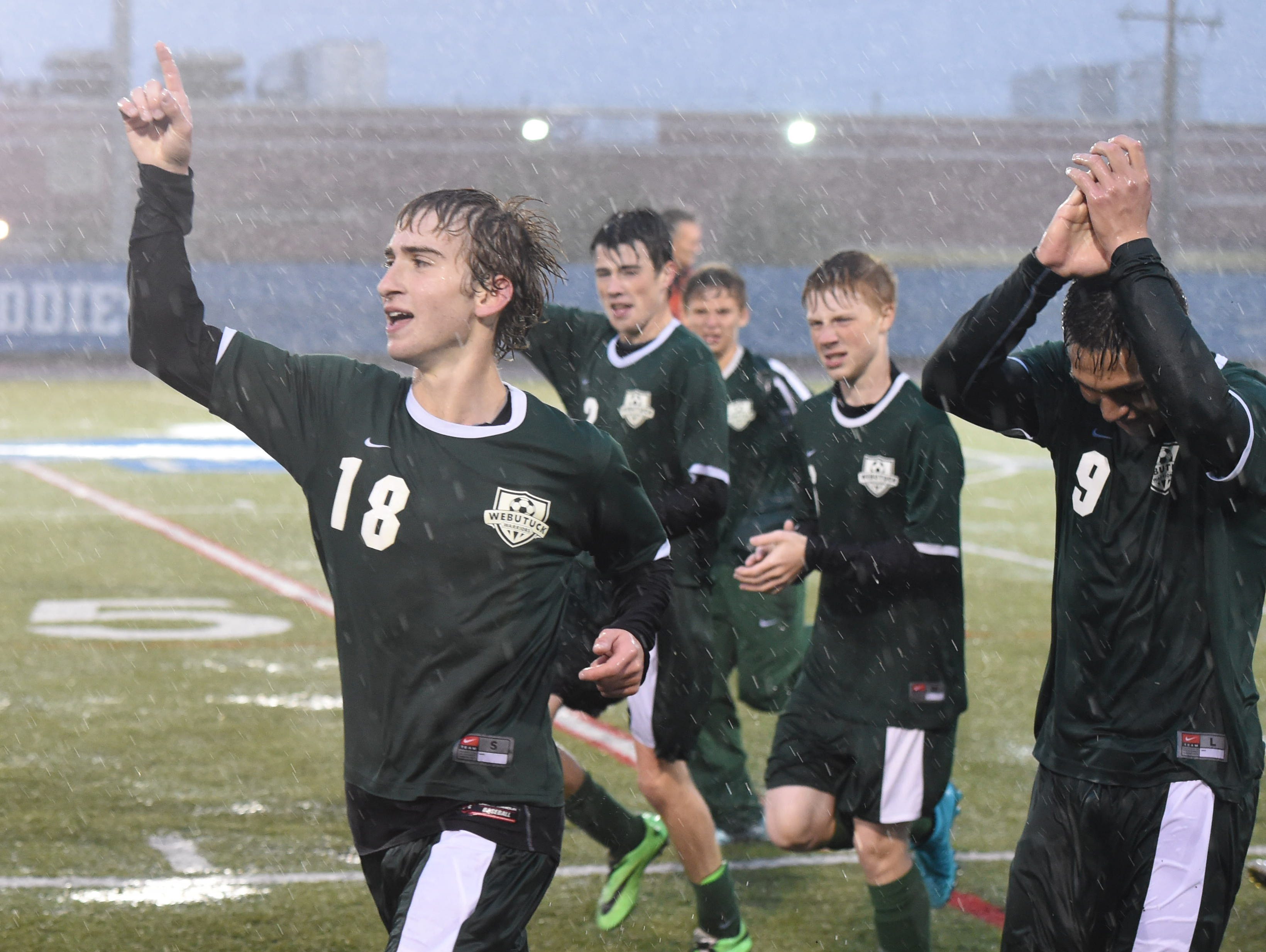Webutuck's Chris Miloneo leads his teammates in celebrating their win over Millbrook for the Section 9 Class C boys soccer championship in October 2015.