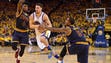 Golden State Warriors guard Klay Thompson (11) drives