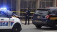 An officer blocks the scene as police respond to reports