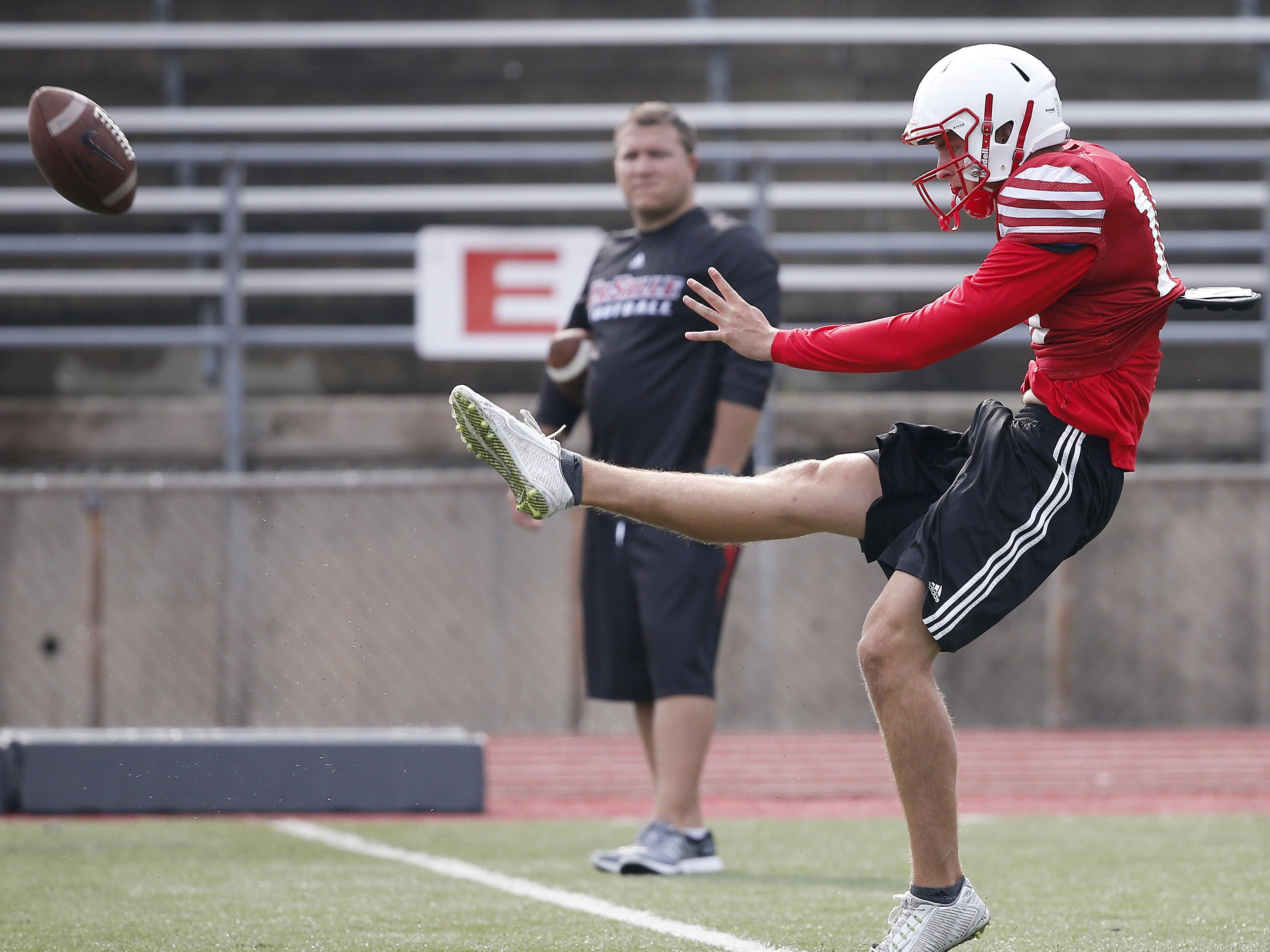 La Salle punter Drue Chrisman punts a ball during practice, Aug. 10, at Marge Schott Field at La Salle High School. Chrisman, committed to Ohio State, is among the best punters in the state.