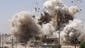 Islamic State militants blow up the historic Al-Qubba Husseiniya mosque on July 5 in Mosul, Iraq. The Islamist extremists have destroyed at least 10 ancient Shiite shrines and mosques in territory they have seized in northern Iraq.