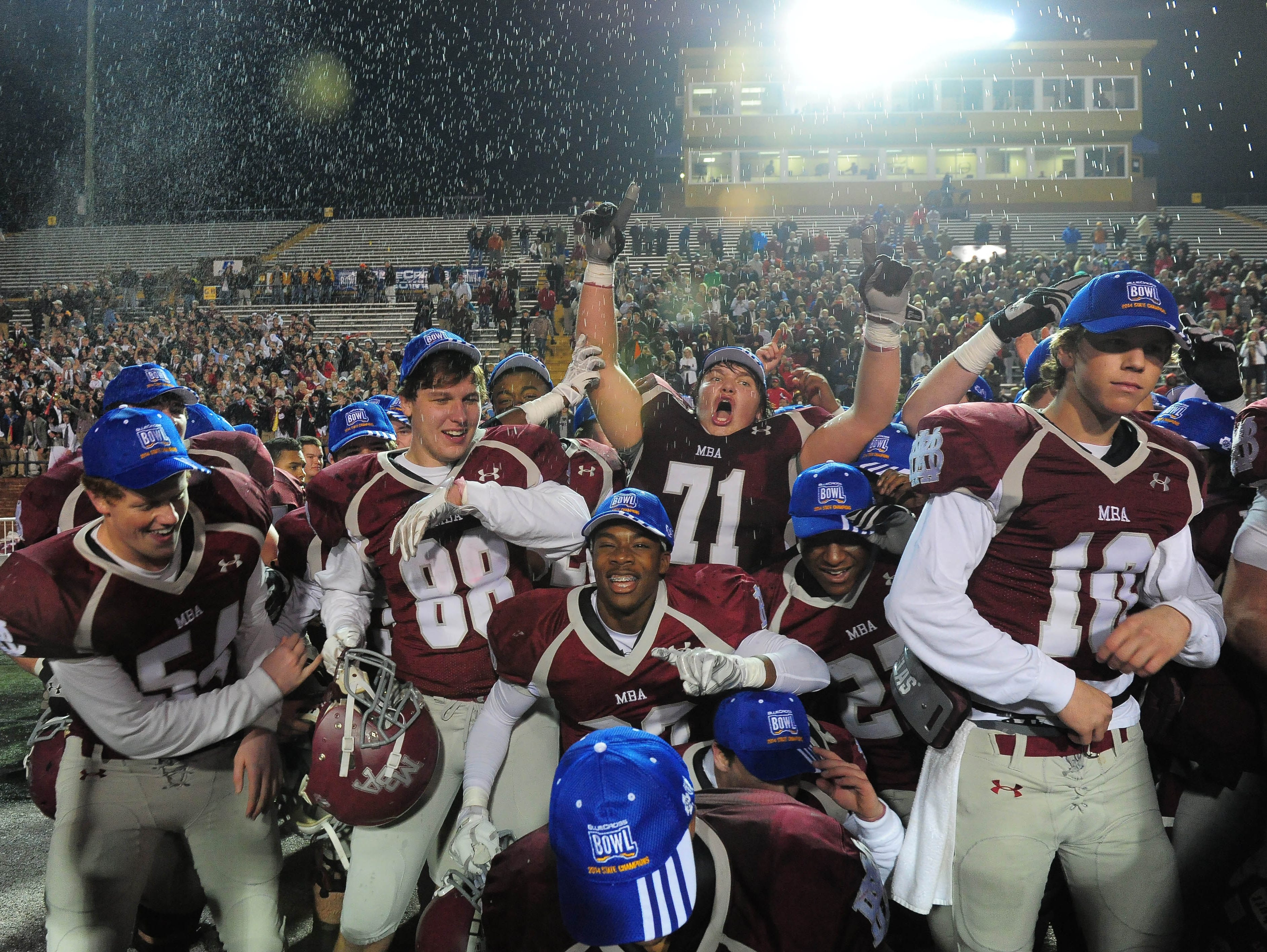 MBA players celebrate a 10-7 win over Ensworth for the Division II-AA state championship last December. Montgomery Bell Academy players celebrate their 10-7 win over Ensworth for the Division II-AA state championship last December.
