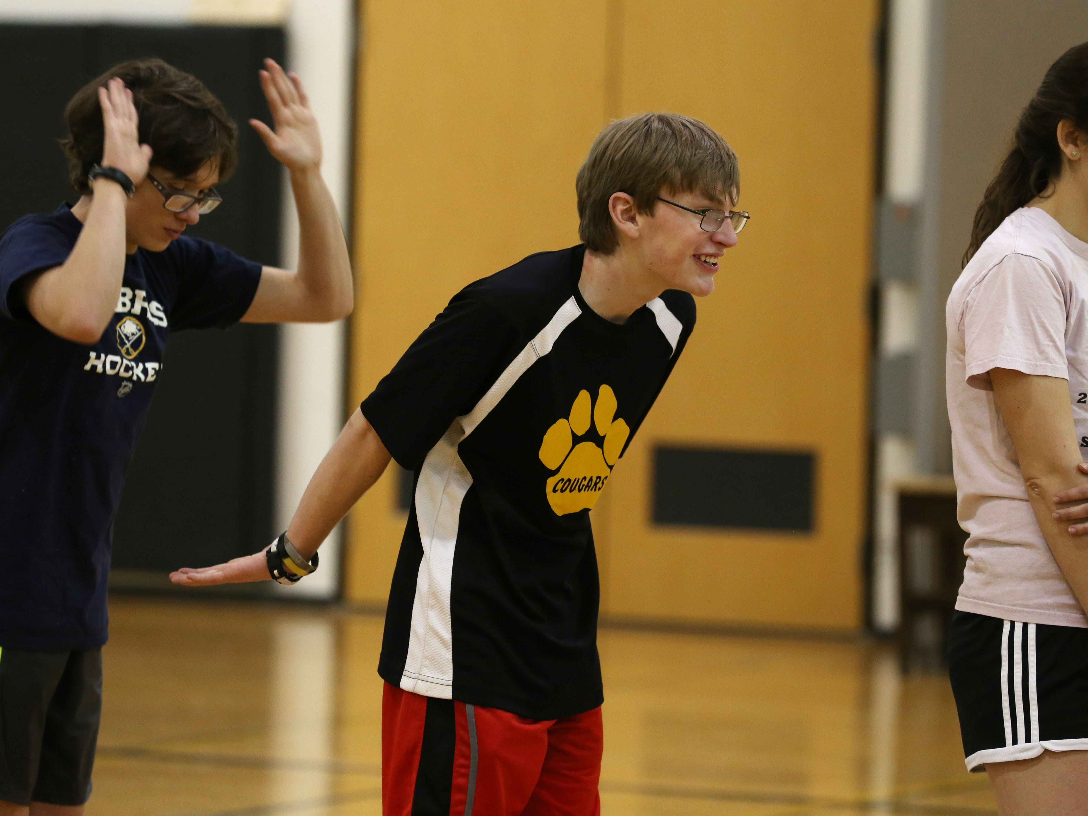 Gavin Germonto and teammate Skyler Smith give each other props on free throw shooting during the second practice for Honeoye Falls-Lima’s unified basketball team.