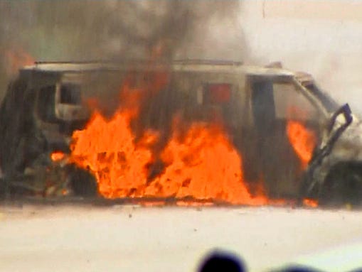Dallas police were letting an armored van burn fearing